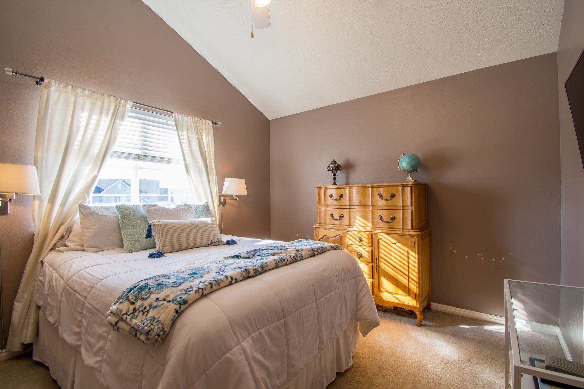 Bright and inviting bedroom interior with neutral tones and elegant decor